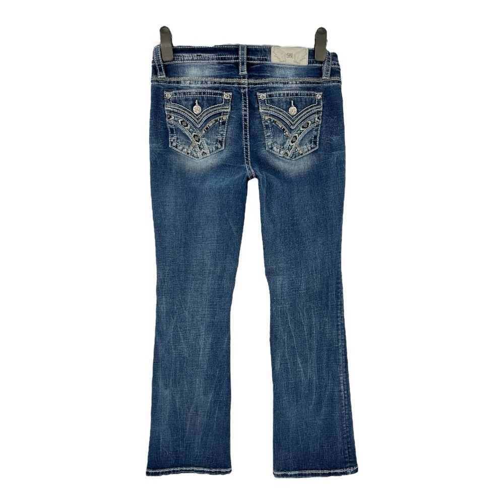 Miss Me Mid-Rise Crossed Bands southwestern Faux Flap Pocket Slim Boot Jean